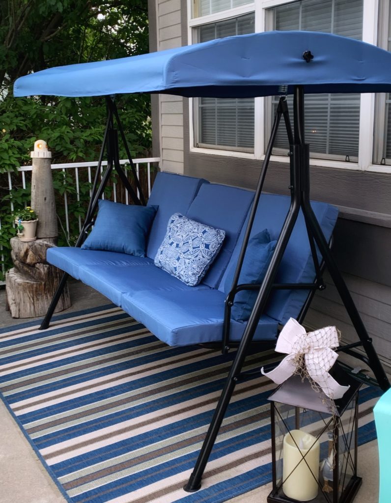 Image of a blue porch swing
